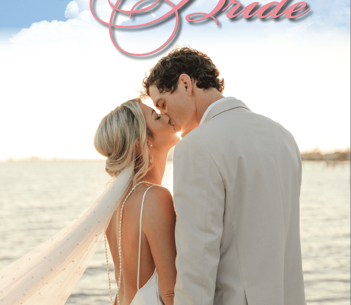 A magazine cover saying Southern Bride 2024, with a photo of a young couple in a tan suit and white bridal gown, kissing