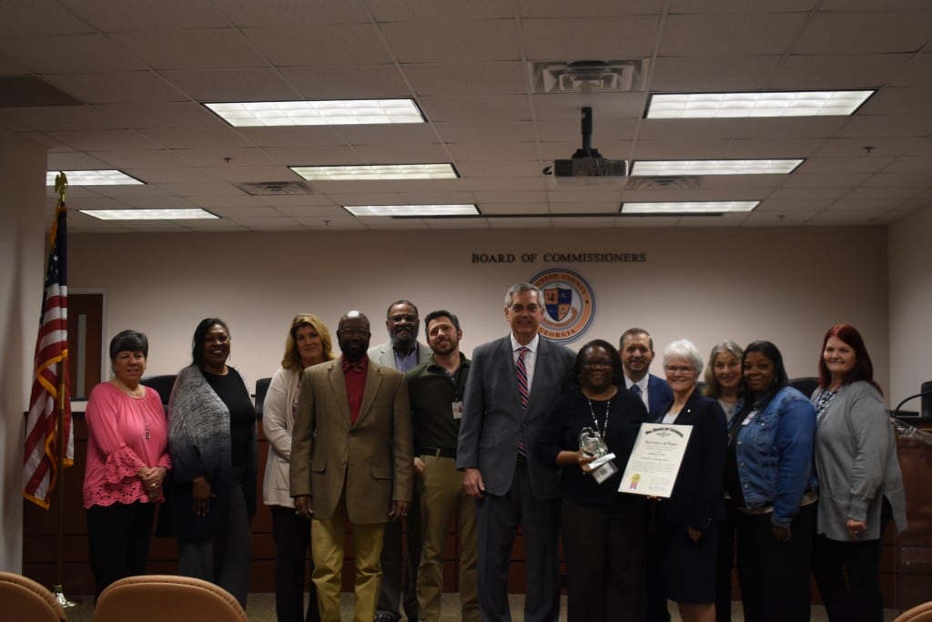 Secretary of State Brad Raffensperger poses with the Houston County Board of Elections including Elections Director Debra Presswood.
