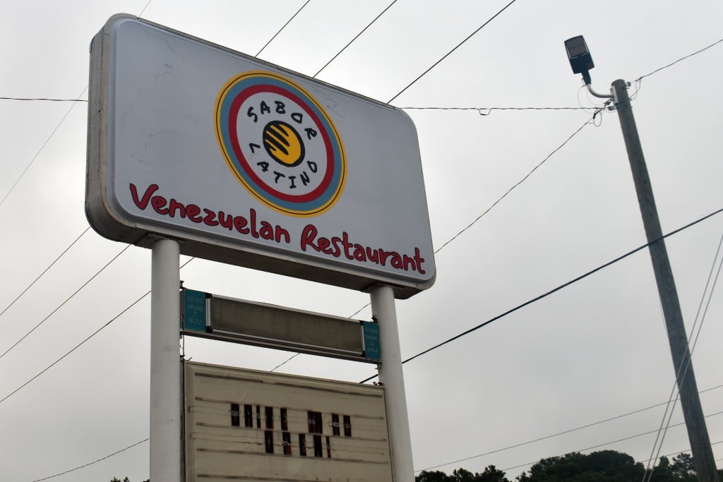 Photo of a sign saying "Sabor Latino Venezuelan Restaurant"