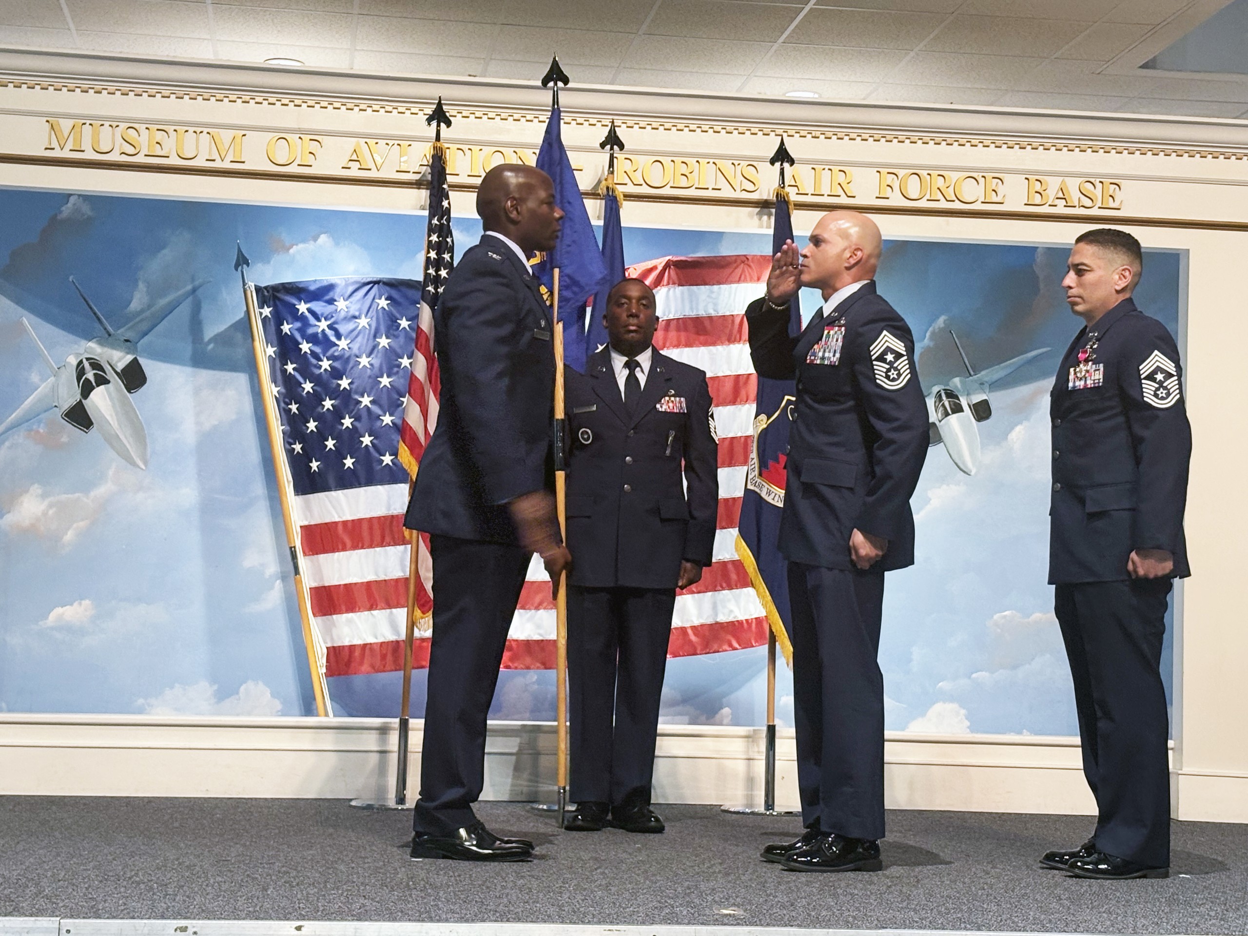 4 men, two African American and two Hispanic wearing Air Force uniforms