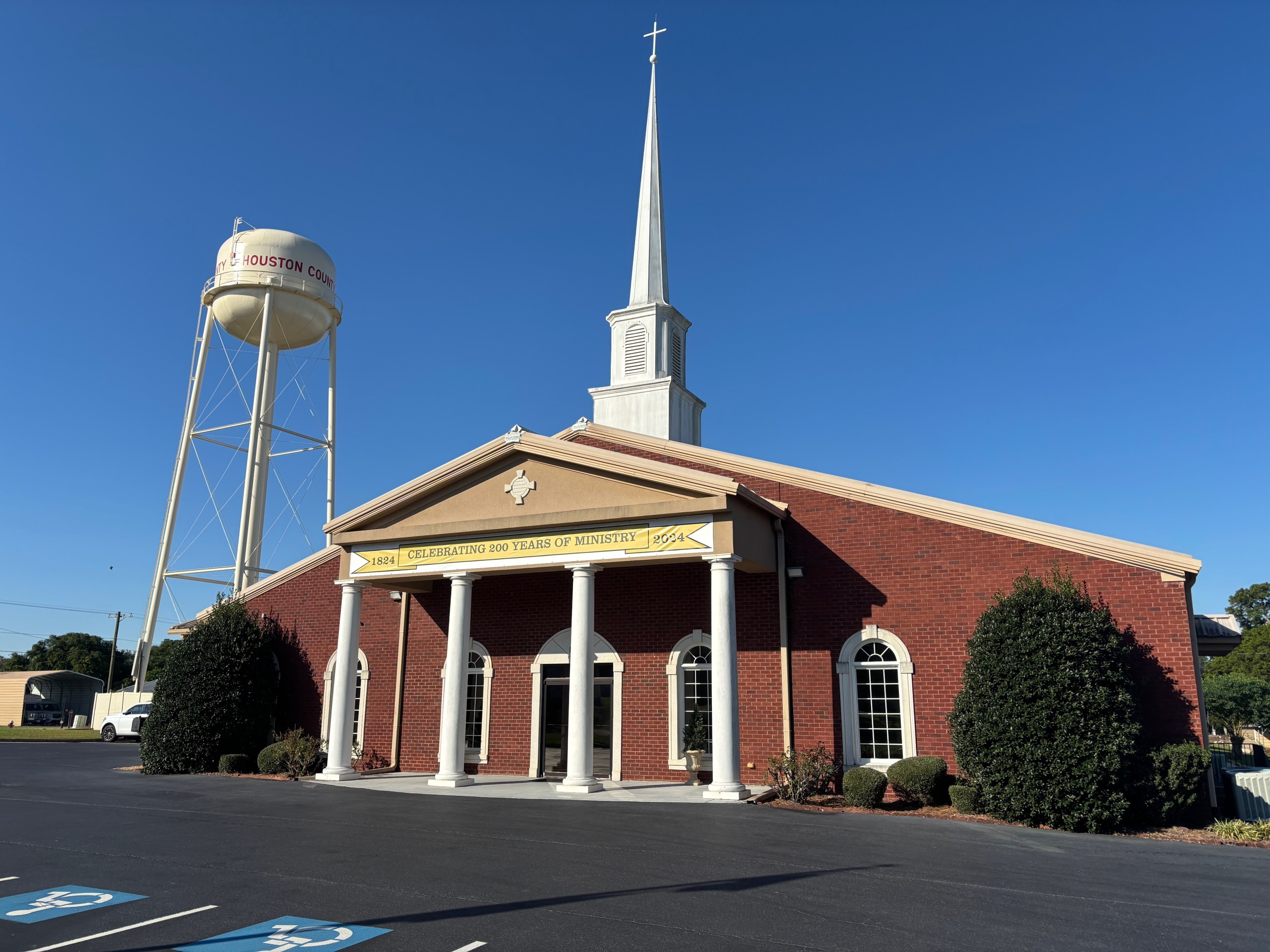 First Baptist Church of Haynesville with a water tower in the background