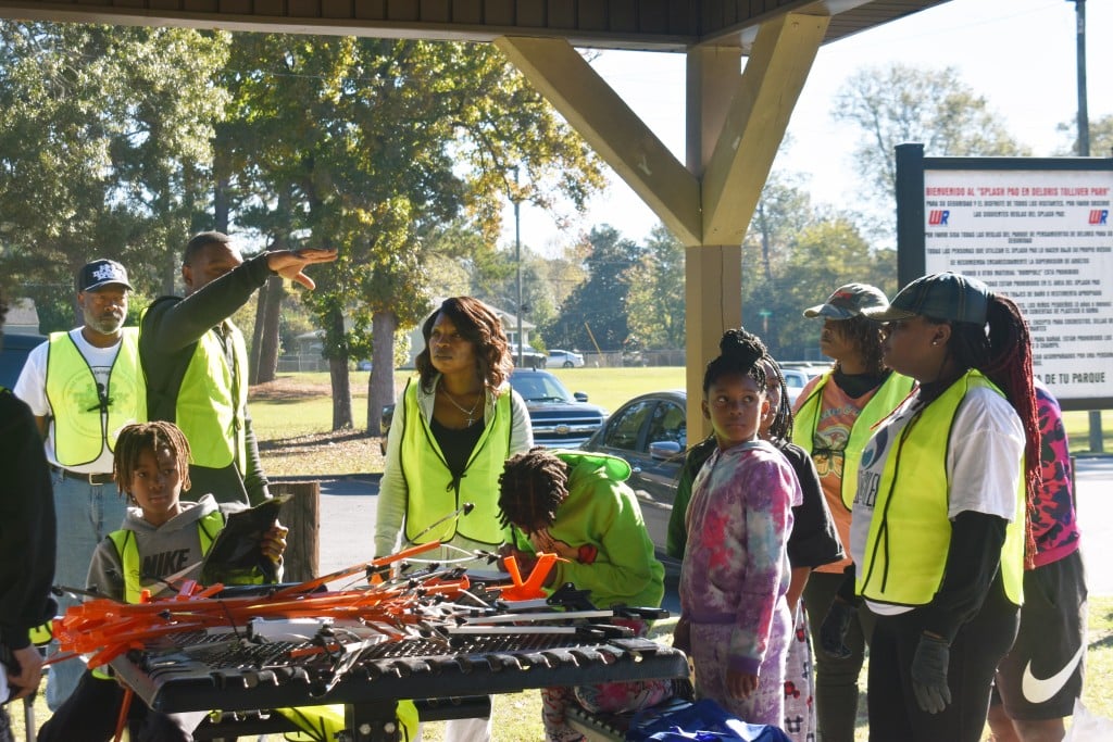 Volunteers listening to directions.