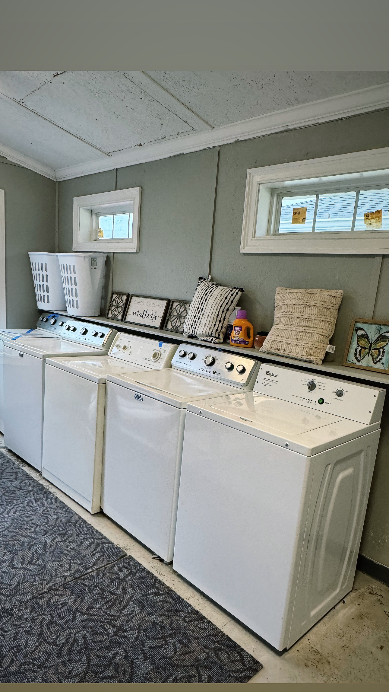 New washer and dryer. Decorations can be seen in the background.
