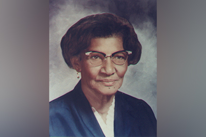 An African American woman looking at the camera.