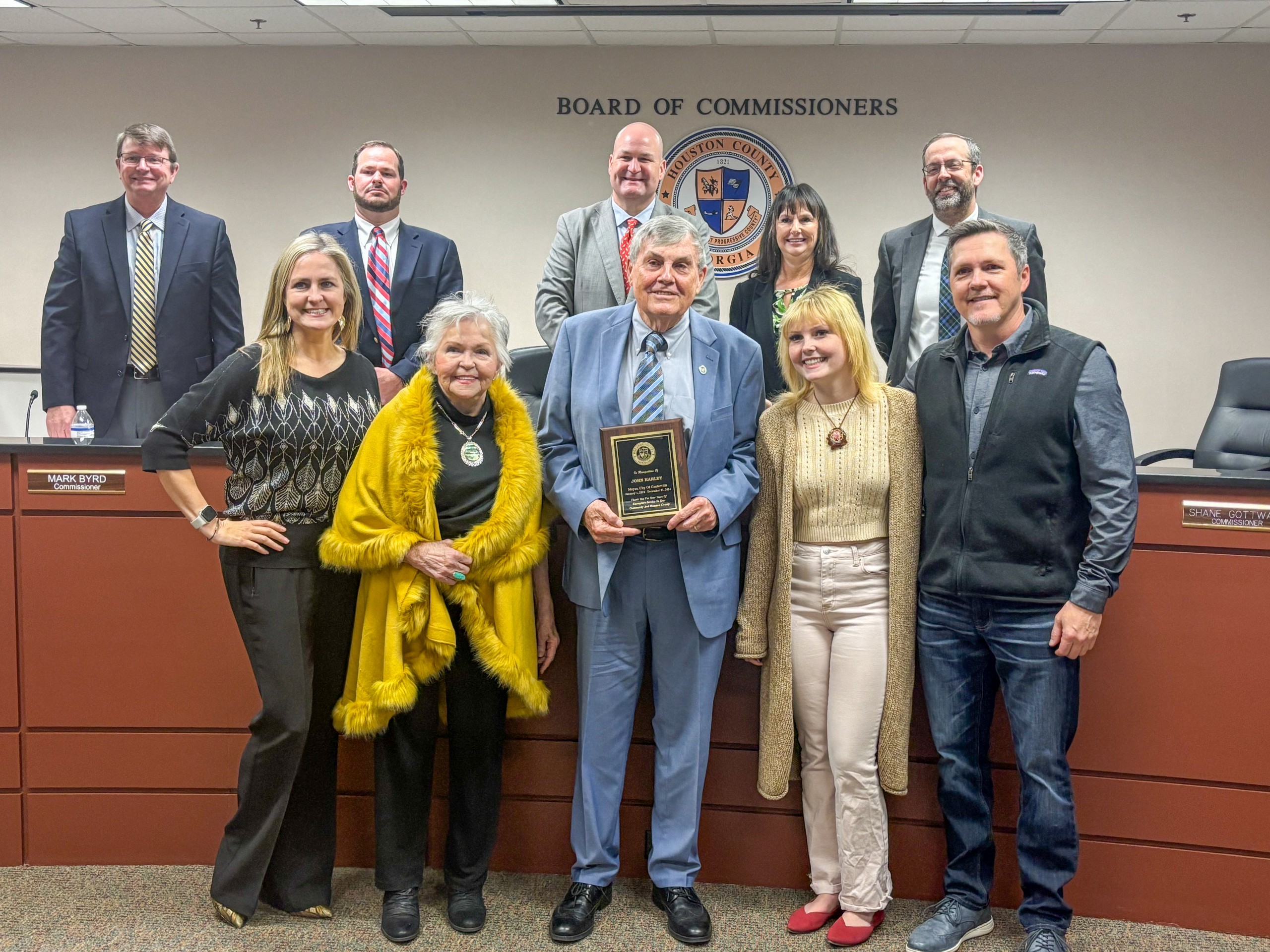Houston County Board of Commissioners with John Harley and his family