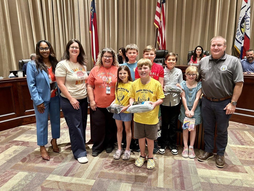 group of people including Mayor LaRhonda Patrick and members of the Kings Chapel Elementary School Beta Club