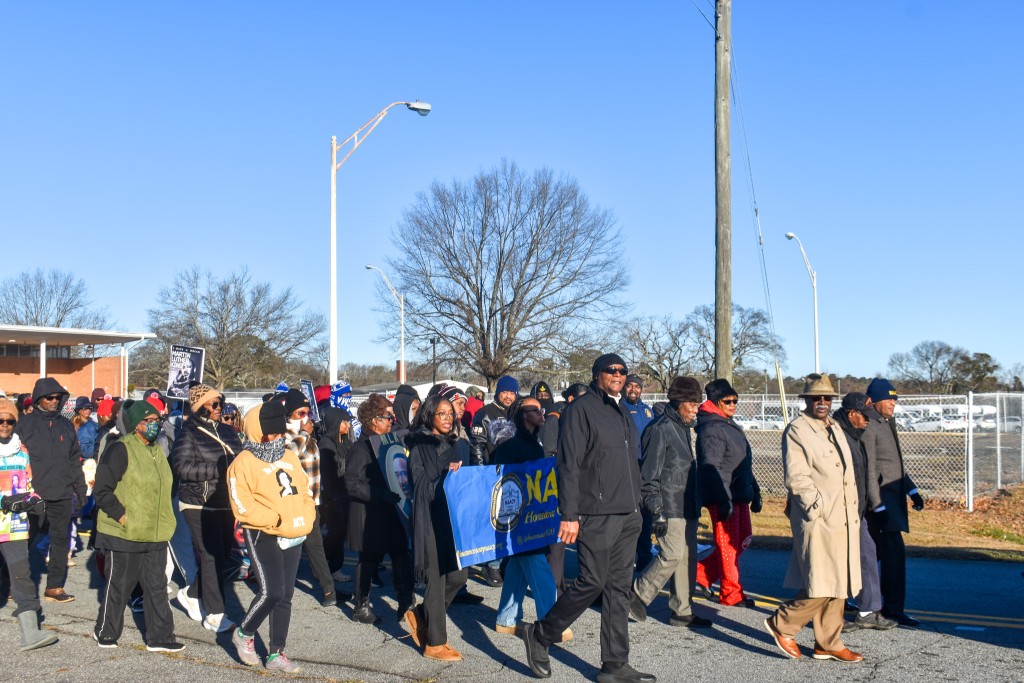 A group of people walking. 