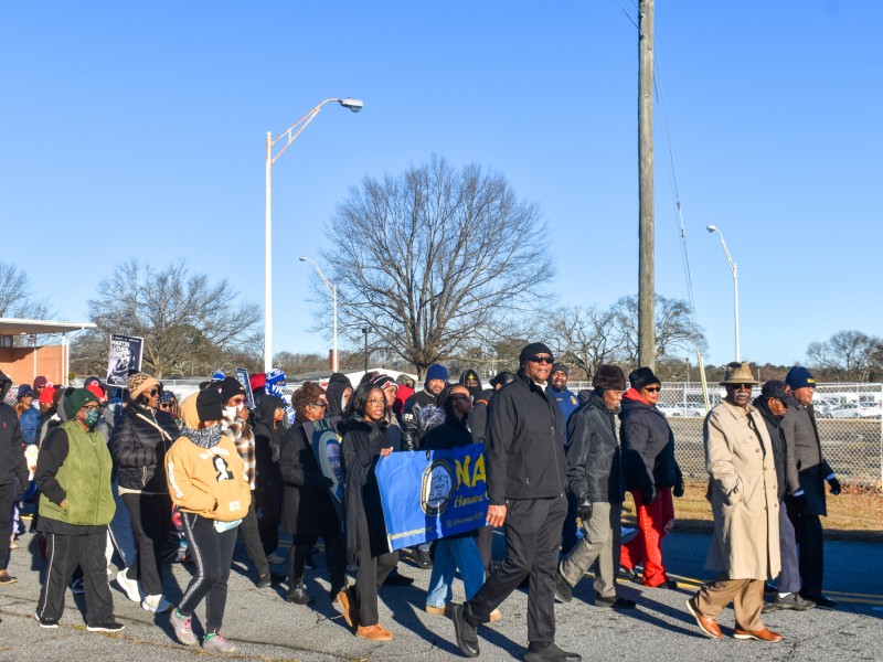 A group of people walking.
