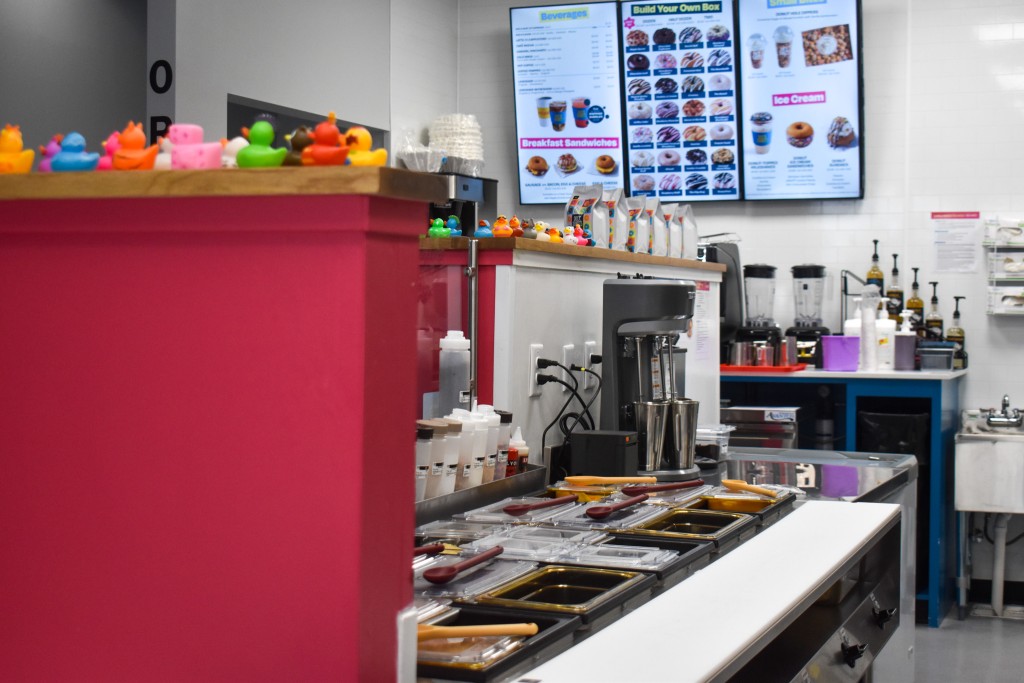 A counter where toppings are located.