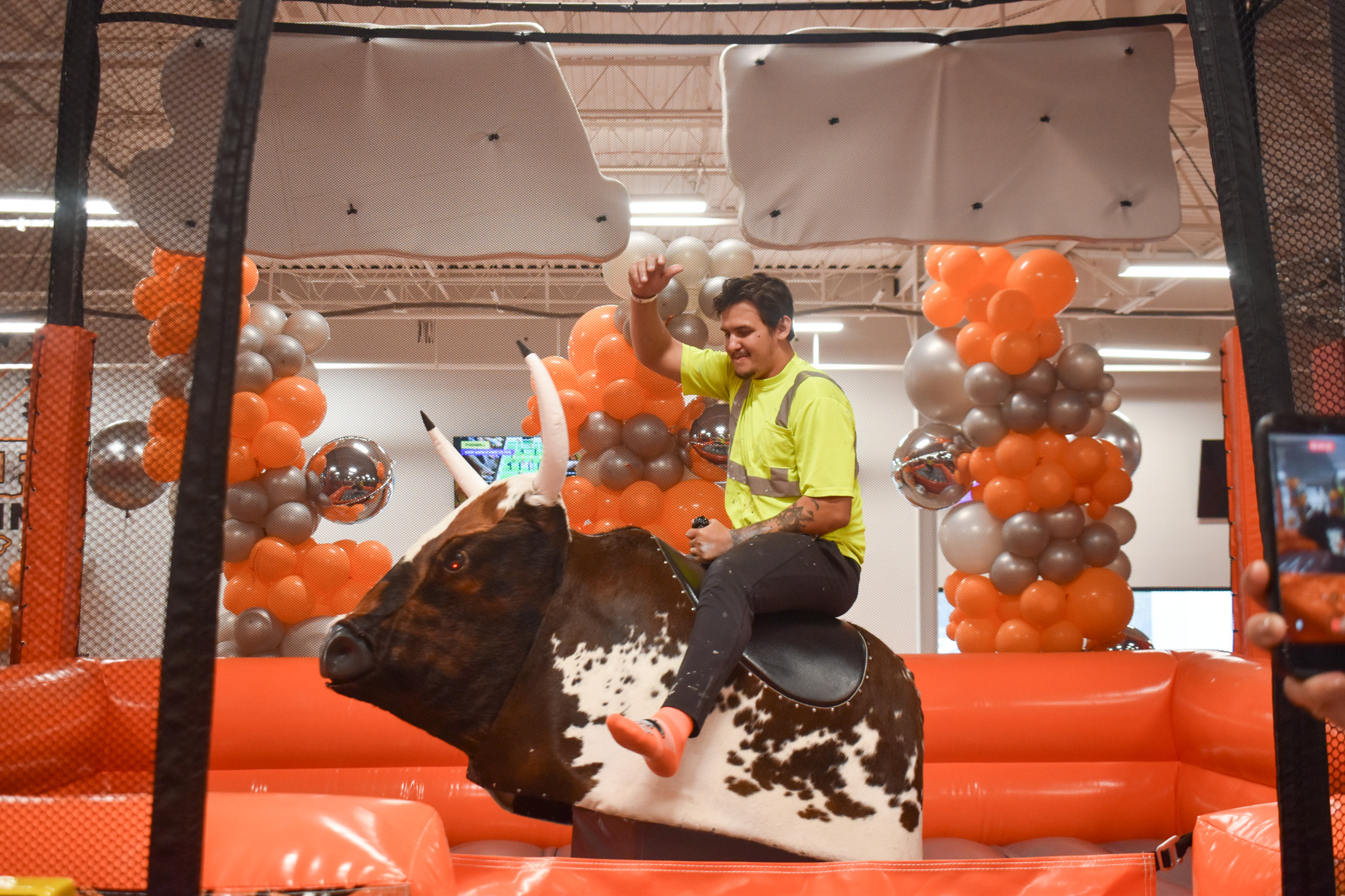 A man riding a mechanical bull